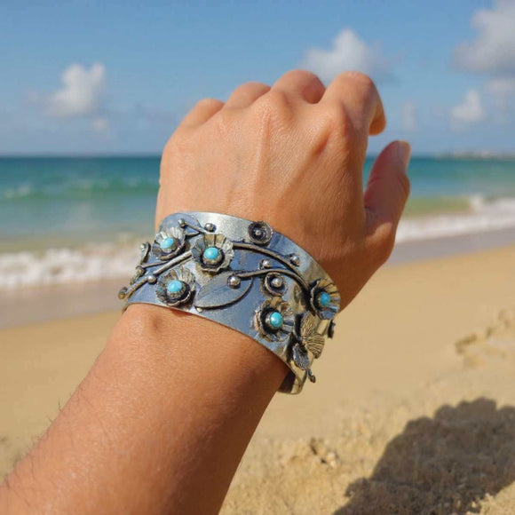 Handcrafted Silver Floral Cuff Bracelet with Turquoise Accents